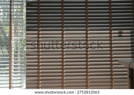 Windows roller blinds home interior design element window detail wooden window blind shutter with daylight from window daytime home interior design concept