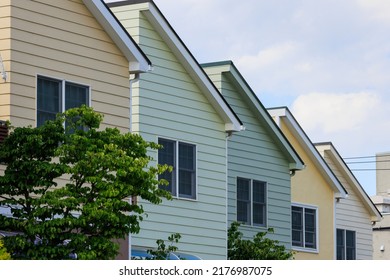 Windows And Roofs Of A Series Of Detached Houses Of The Same Shape