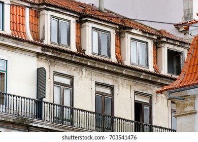 Windows and Terra Cotta Roofs in Lisbon, Portugal, Europe - Shutterstock ID 703541476