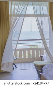 Winds Blowing Curtains On The Balcony With Sea View