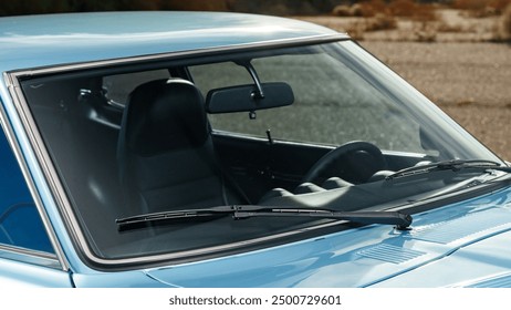 Windshield of a blue car