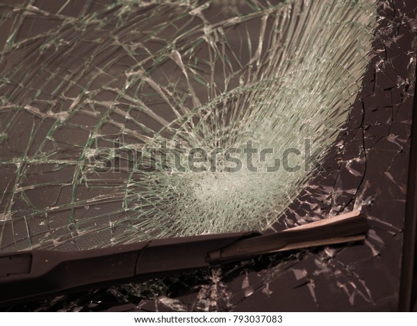 windshield broken in close\
up