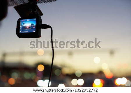 Windshield mounted dashcam recording while driving