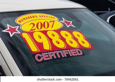 Windshield Price Sticker On A Used Car Lot For Sale