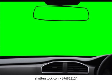 Windshield And Rear View Mirror ,View Inside The Car With Green Scree Isolated On Background With Clipping Path.