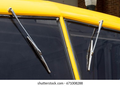 Windshield Wipers On A Yellow Vintage Milk Truck