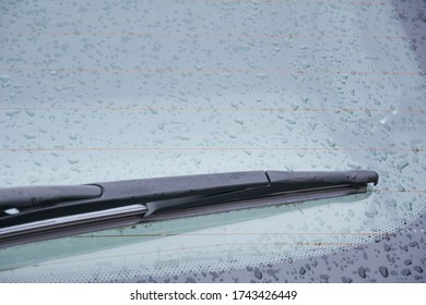 Windshield Wipers From Outside Of Car. Season Rain, Raindrop.