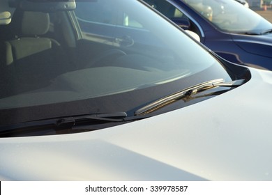 Windshield wipers white car