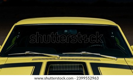 Windshield of a yellow car