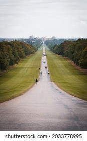 Windsor, Berkshire, England UK - August 2021: Looking down The Long Walk at Windsor Castle in the distance when open to the public