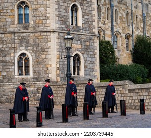 Windsor, Berkshire-UK-9 16 2022: A Vigil By Five Uniformed Wardens Outside The Henry VIII Gates Of Windsor Castle, England, Pays Respect Following The Death Of Queen Elizabeth 11.