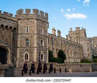 Windsor, Berkshire-UK-9 16 2022: A Vigil By Five Uniformed Wardens Outside The Henry VIII Gates Of Windsor Castle, England, Pays Respect Following The Death Of Queen Elizabeth 11.