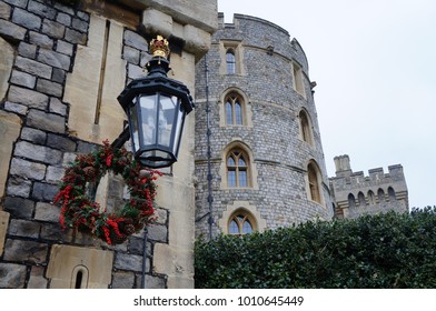 Windsor Castle With Lantern And Christmas Wreath On The Foreground, UK