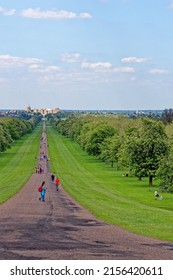 Windsor Castle viewed down the Long Walk with people enjoying the view and warm summer sun Windsor Berkshire United Kingdom - 31th of May 2021