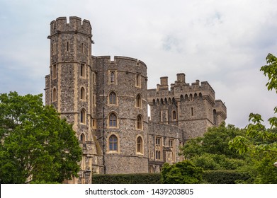 WINDSOR, ENGLAND -MAY, 24 2018: Windsor Castle, Built In The 11th Century, Is   The Residence Of The British Royal Family At Windsor In The English County Of Berkshire, United Kingdom  
