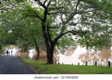 Windsor, New South Wales, Australia, 03.05.2022: A Park Under Water And Spectators Overlooking The Flooded Hawkesbuy River During The East Coast Floods In 2022.