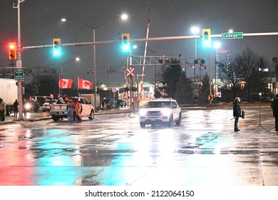 Windsor, ON - 2.11.2022: Traffic By Night At The Trucker Blockage Protest Near The Ambassador Bridge. Demonstration At The Windsor - Detroit Border To Protest Vaccine Mandate For Commercial Drivers