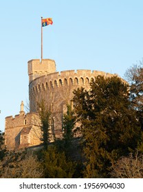 Windsor, UK, April, 2021 - Windsor Castle Main Tower With The Royal Standard Flag On Full Mast To Signify That The Queen Is In Residence At The Castle Leading Up To The Funeral Of Prince Philip