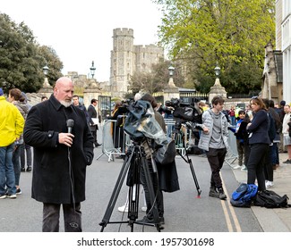 Windsor, UK, April, 2021 - A German Television Rreporter Outside Of Windsor Castle Just Before The Funeral Of Prince Philip, Duke Of Edinburgh