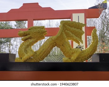 WINDSOR, UNITED KINGDOM - Apr 06, 2018: A Gold Dragon In Legoland Windsor