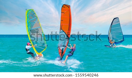 Windsurfer Surfing The Wind On Waves In Cesme bay, Izmir, Turkey