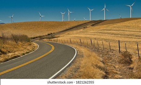 Windy Country Road Through Wind Farm