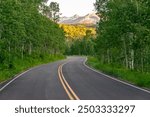 Windy curvy mountain road at sunrise