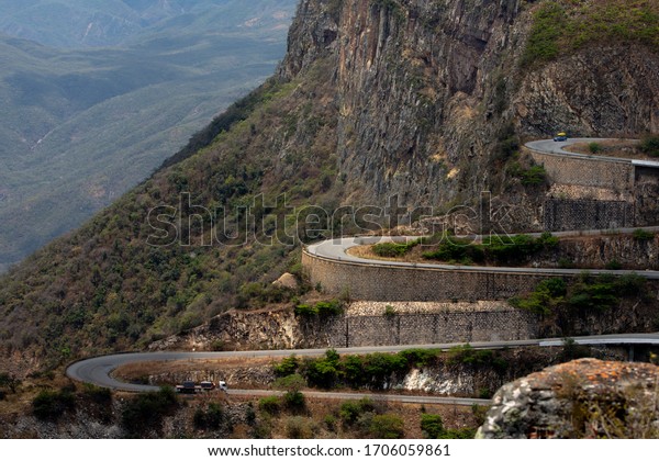Windy road in Angola. Steep road with many corners\
in Angola