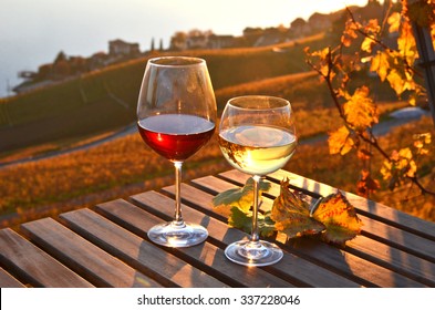 Wine against vineyards in Lavaux, Switzerland - Powered by Shutterstock