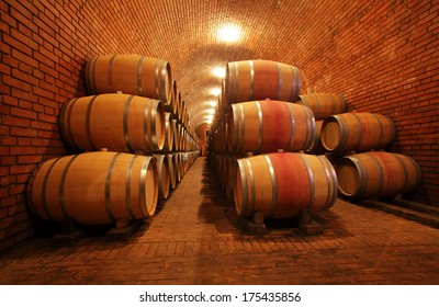 Wine barrels in the cellar in order