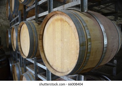 Wine Barrels In Storage At A Winery In The Adelaide Hills, South Australia.