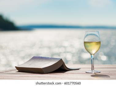 Wine And Book By The Sunny Sea