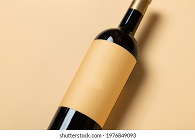 Wine Bottle With Blank Label On Beige Background