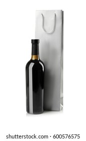 Wine Bottle And Gift Bag On White Background