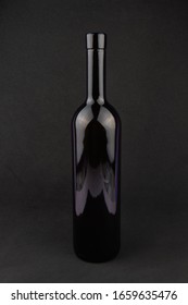 Wine Bottle On Black Background