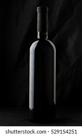 Wine Bottle Silhouette Isolated On Black Background