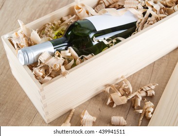 Wine Bottle In Wooden Box