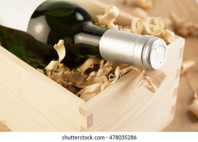 Wine Bottle In Wooden Box