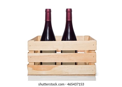 Wine Bottle In Wooden Crate, Isolated On White