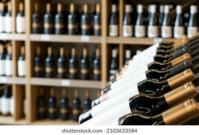 Wine Bottles With Blank Labels On The Counter Of A Liquor Store. Wine Background.