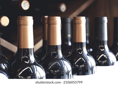 Wine Bottles With Blank Labels On The Counter Of A Liquor Store. Wine Background. Selected Focus