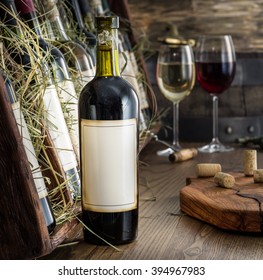 Wine Bottles On The Wooden Shelf.