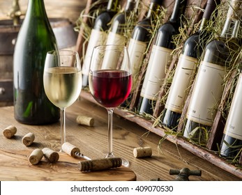 Wine bottles on the wooden shelf. Wine cellar.