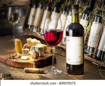 Wine Bottles On The Wooden Shelf.