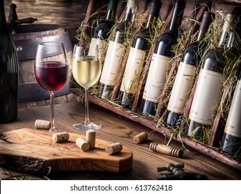 Wine Bottles On The Wooden Shelf.