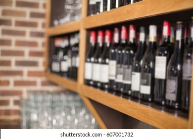 Wine Bottles In A Shelf At A Bar