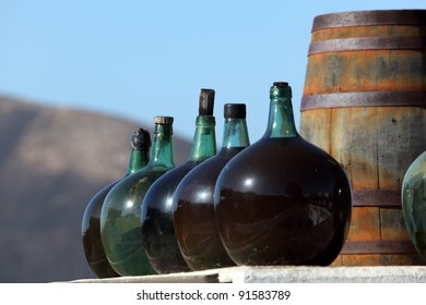 Wine Bottles In A Winery On Canary Island Lanzarote, Spain