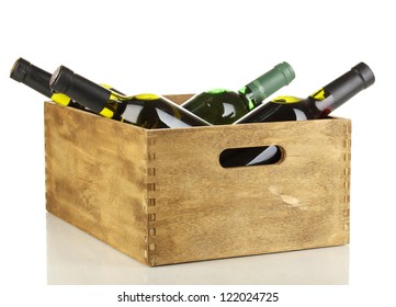 Wine Bottles In Wooden Box Isolated On White