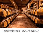 Wine cellar. Wine barrels in a winery in Spain.