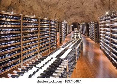 Wine cellar with wine bottle and glasses 